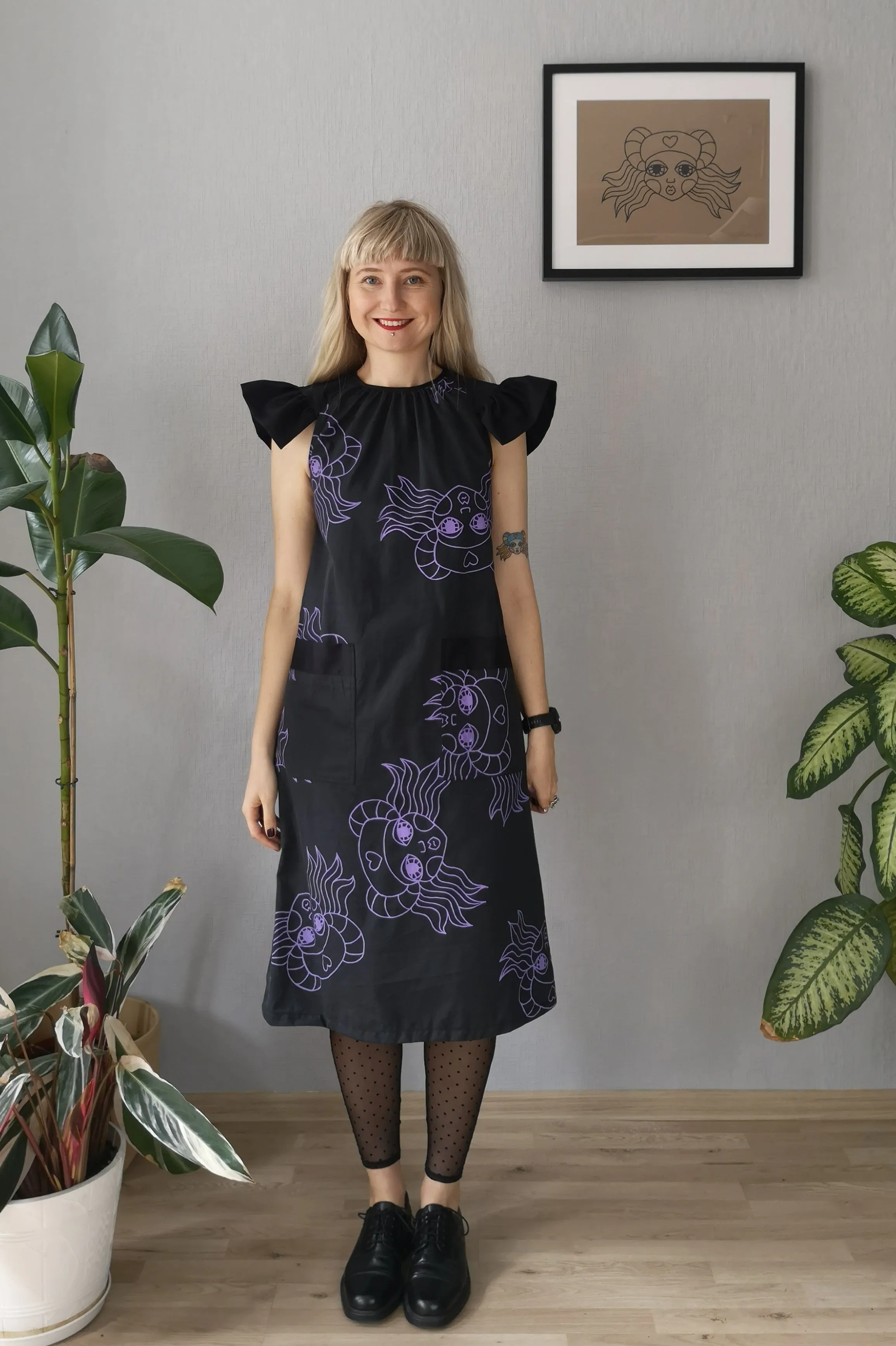 Amelia Earhart Dark Grey Cotton A line dress with oversized butterfly sleeves and Hand printed lavander heroine Lacplesene pattern